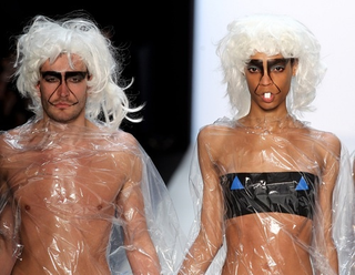 Illustration for article titled Scary Card-Playing Clowns, Lady Gaga Monsters, And Saran-Wrap Savages: Has Fashion Gone Insane?